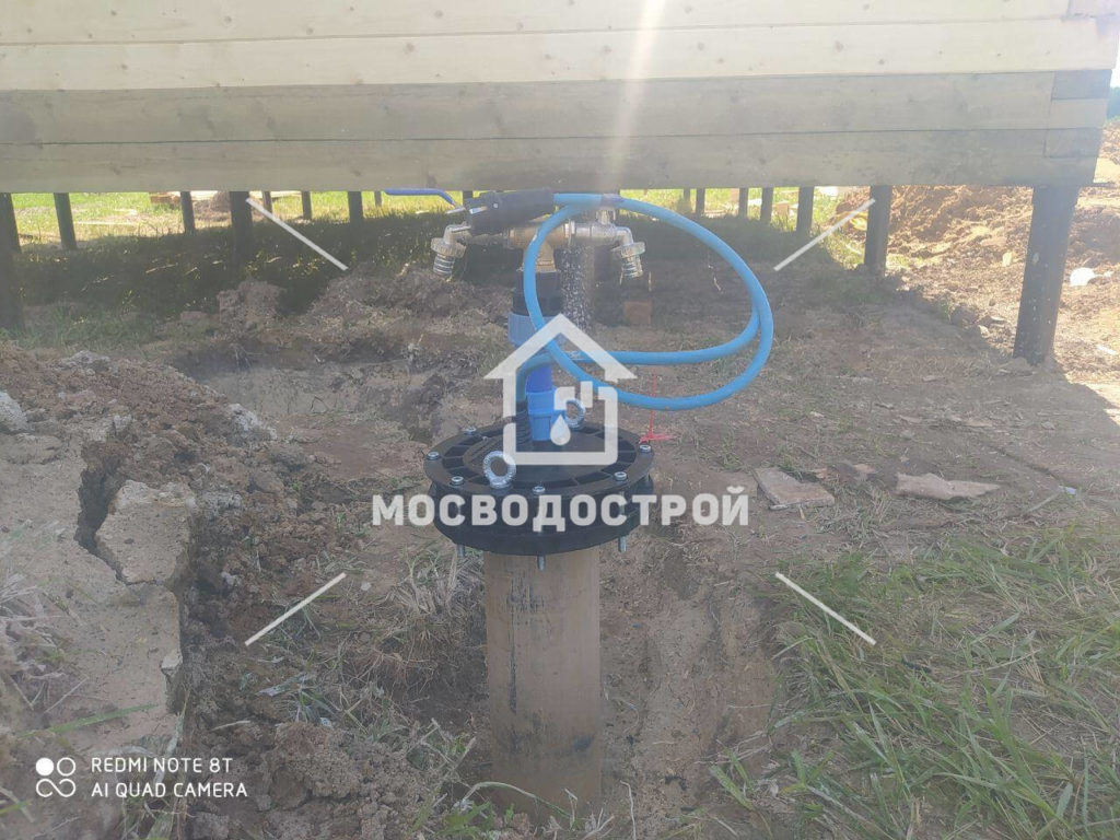 Скважина с оголовком в кп новинское